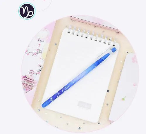 Box containing 12 colourful Constellation quick-drying gel pens for office and writing tasks.
