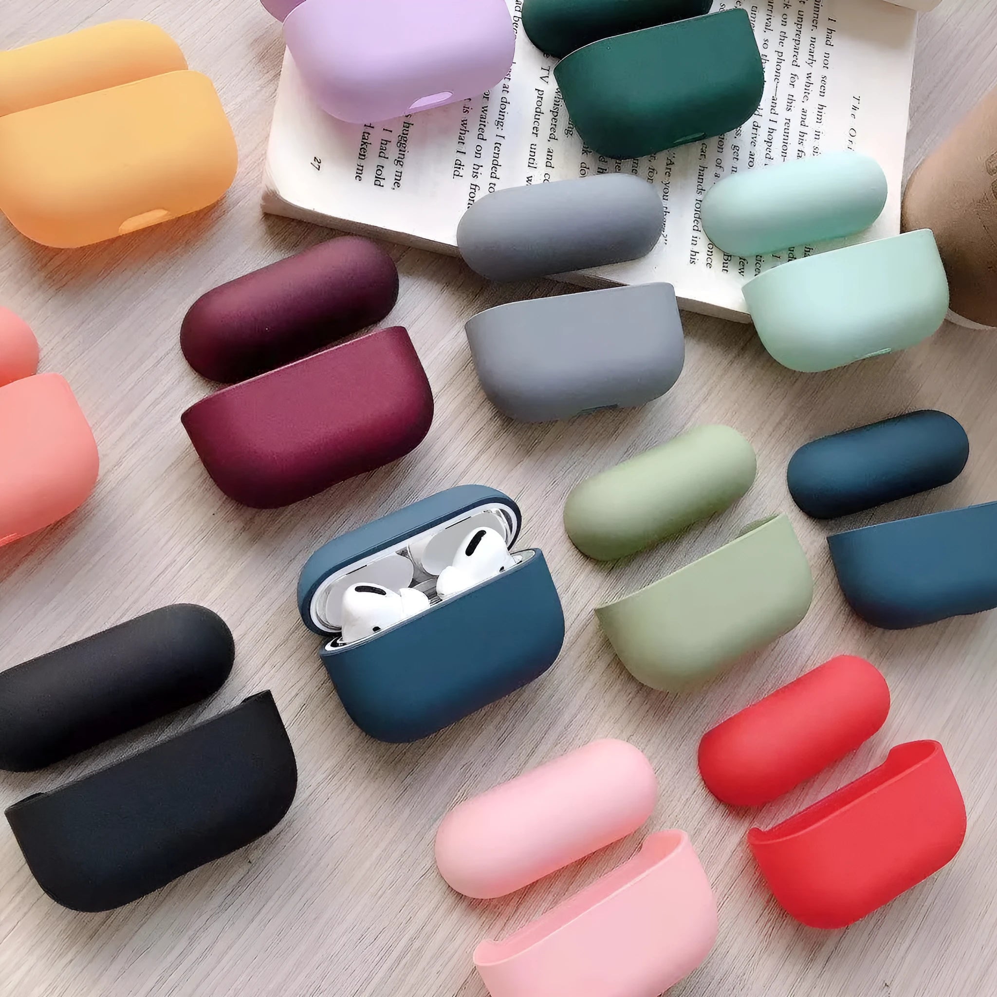 Plastic protective case for compatible AirPods Pro earbuds shown in a selection of colours.