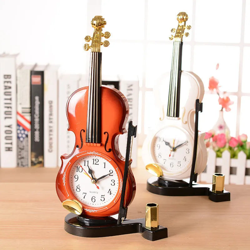 Brown violin pen inserted alarm clock with LED and pointer display, plastic body, 290 x 145 mm