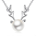 Small elk pearl pendant in copper with gold finish, front view against white background
