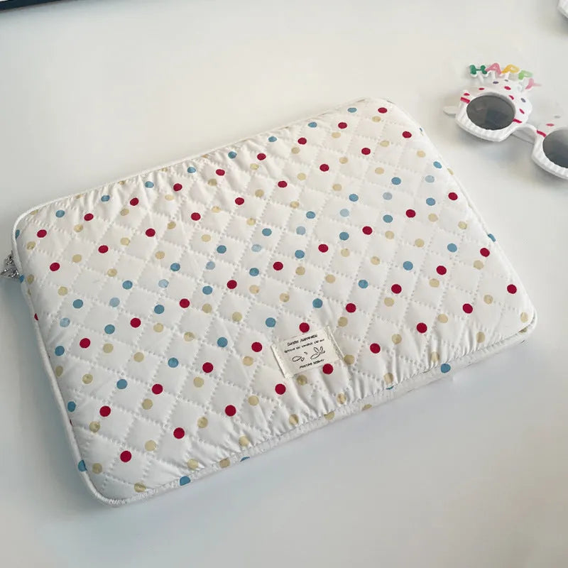 Polka dot women's laptop bag with storage compartments available in three size options