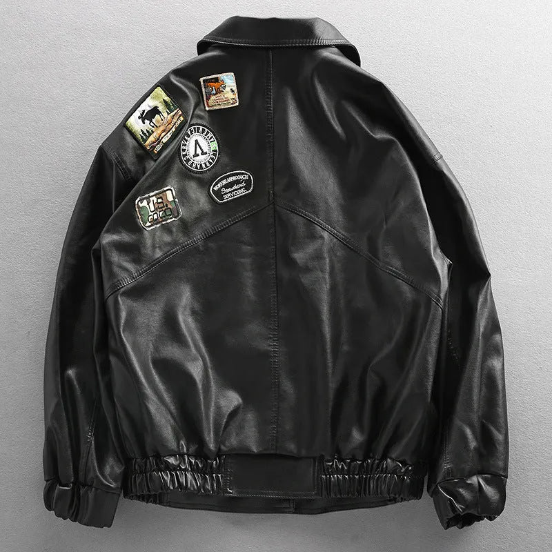 Men's black PU leather biker jacket loose street style with padded design on a model