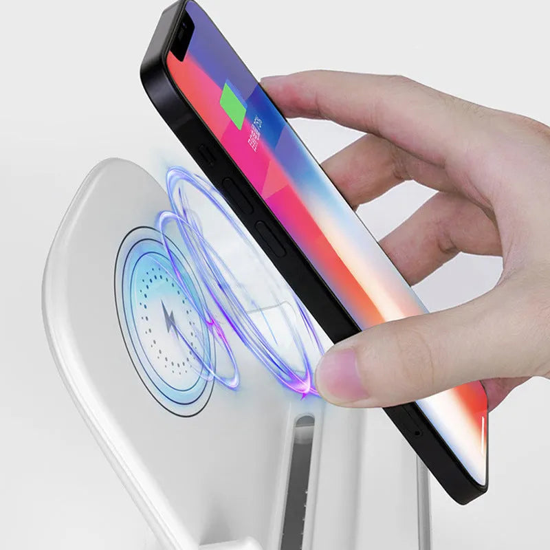 White desktop vertical wireless charging stand with a mobile phone placed on it, 15W fast charging