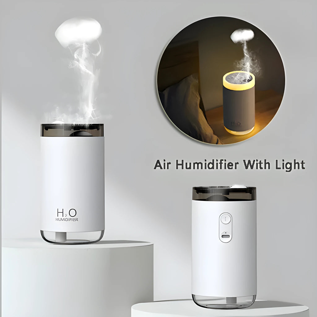 White USB humidifier emitting jellyfish-shaped smoke ring mist with warm night light glow on a table