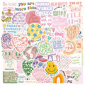 Danish pink motivational statement stickers with graffiti and cartoon designs on a laptop.