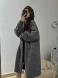 Women's loose fit V-neck knitted cardigan in khaki, mid-length at 65cm with long sleeves.