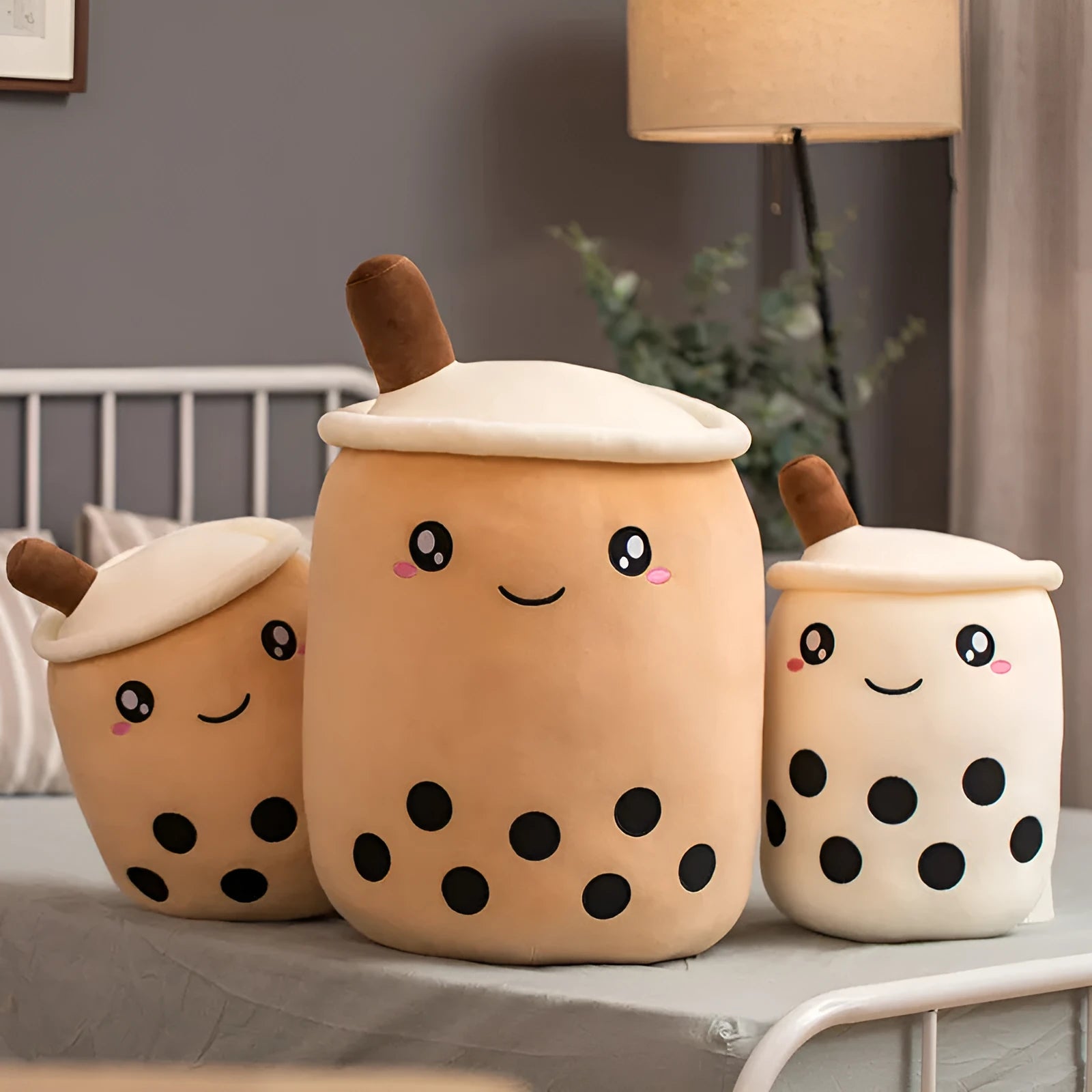 Brown boba milk tea plushie toy with fruit shape on a white background