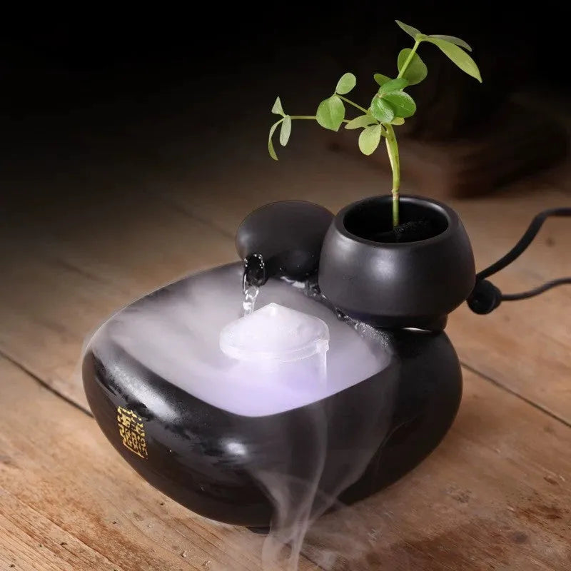 Creative ceramic desktop flowing water fountain ornament with atomizing humidifier in milky white finish