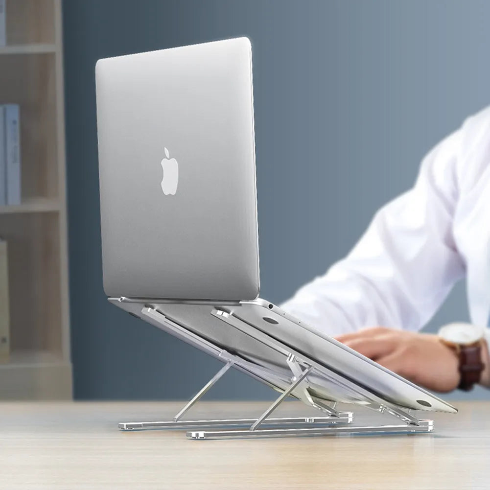 Aluminium foldable laptop stand in silver colour showing adjustable height and compact folded size.