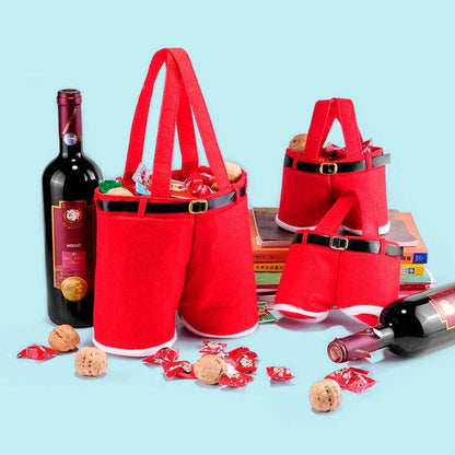 Festive Christmas-themed tote bag in the shape of Santa's iconic red pants, perfect for holding holiday treats and gifts