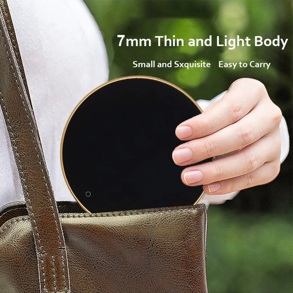 Black USB heating coaster with touch control for warming cups, showing three coloured indicator lights