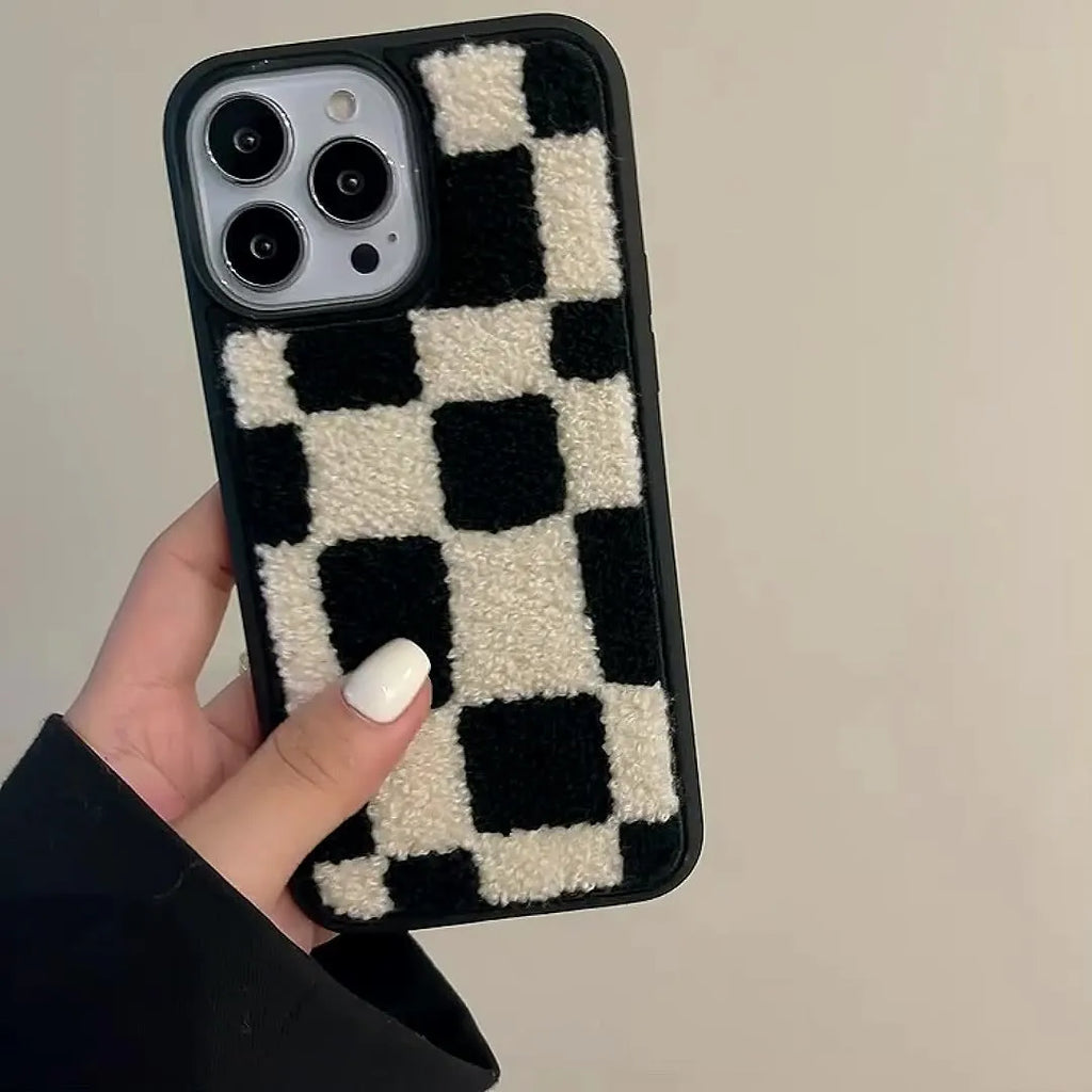 Black and white lattice silicone back cover for Apple iPhone, protective case on a white background