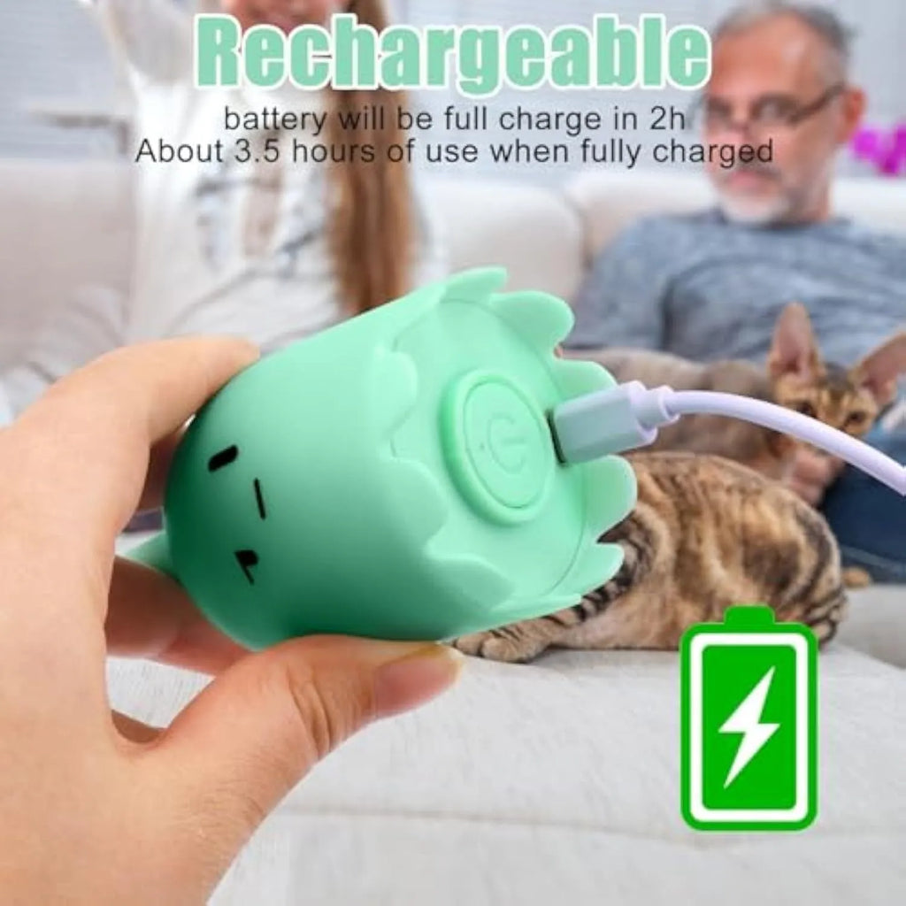 Electronic cat toy with swinging green silicone tail on plastic base