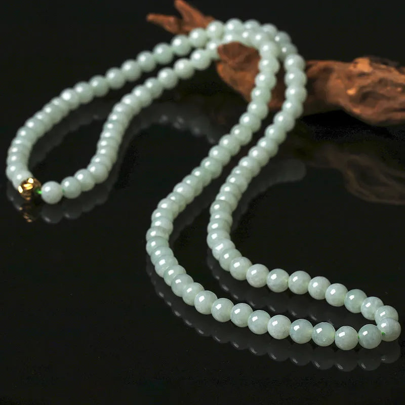 Adjustable jade bead necklace with 6.5mm round beads showing white and green colour variations