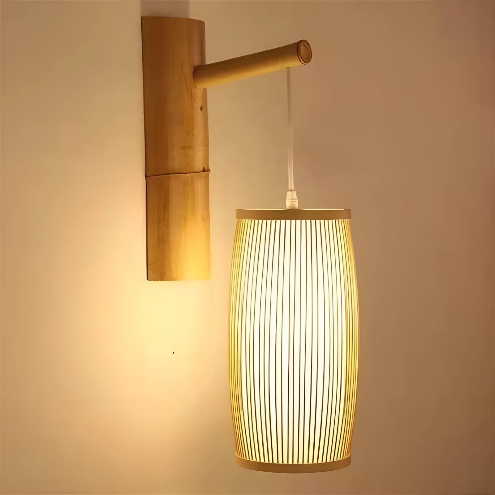 Small woven bamboo pendant lamp with E27 holder, 15cm wide by 35cm high.