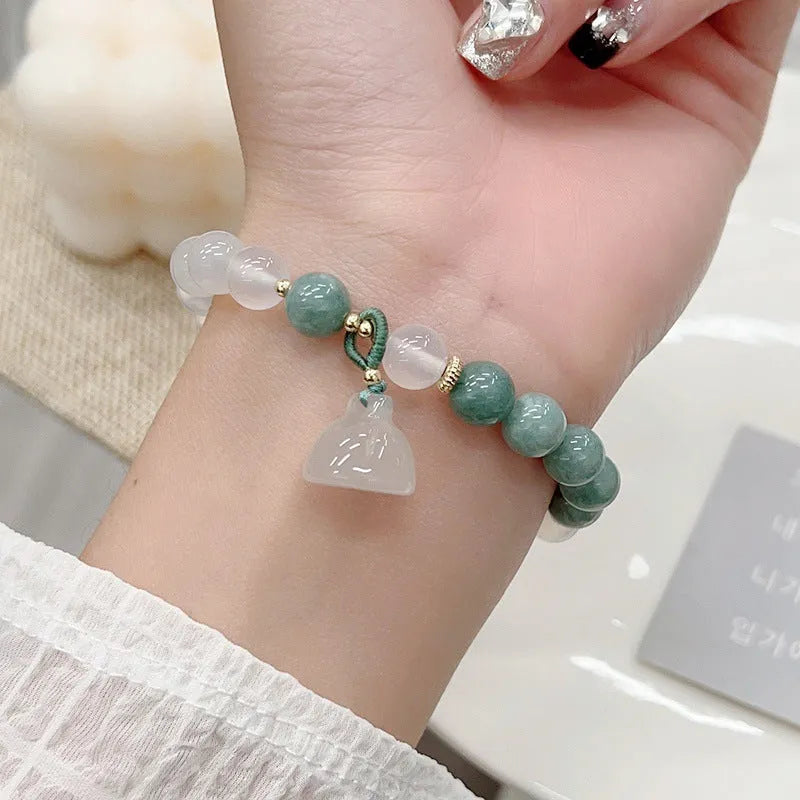Women's retro Chinese style agate bracelet with carved lotus seedpod design