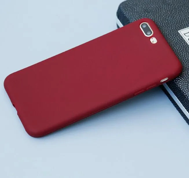 Frosted matte soft shell phone case for iPhone, shown in multiple colour options including blue, pink and black.