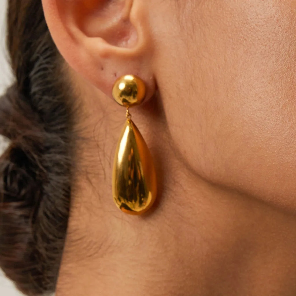 Gold electroplated stainless steel hemisphere earrings with water drop pendant design for women