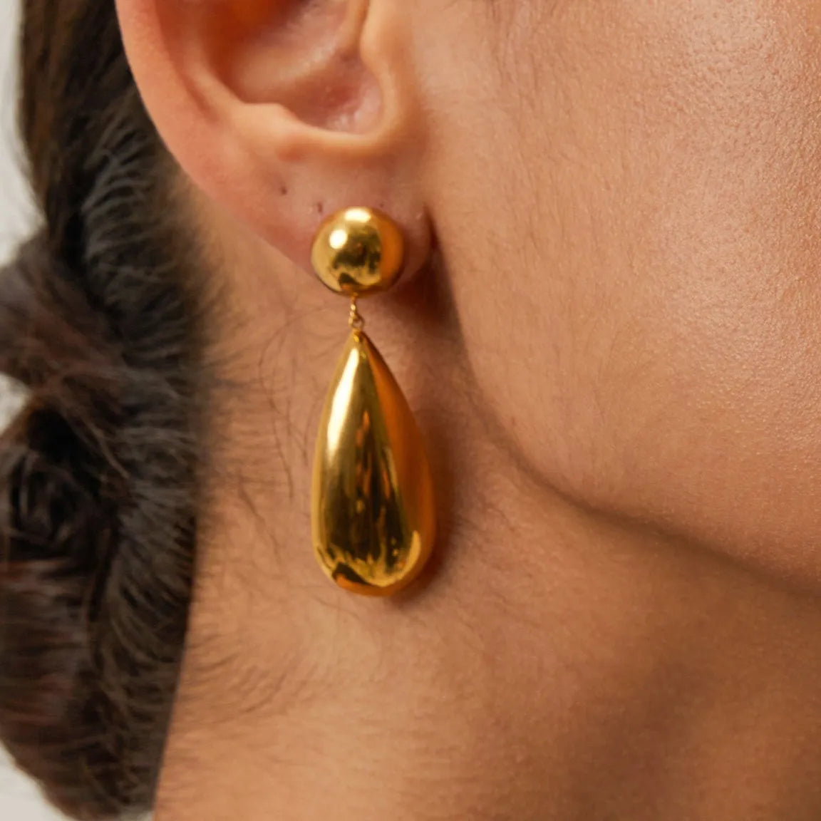Gold electroplated stainless steel hemisphere earrings with water drop pendant design for women