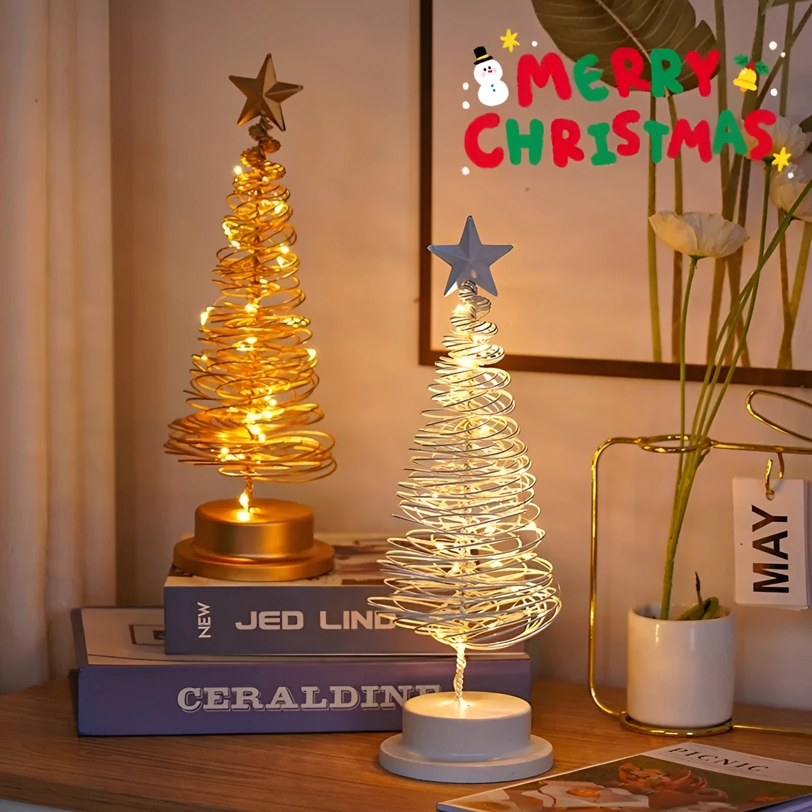 Metal spiral Christmas tree table lamp with warm white LED lights, 33cm tall.
