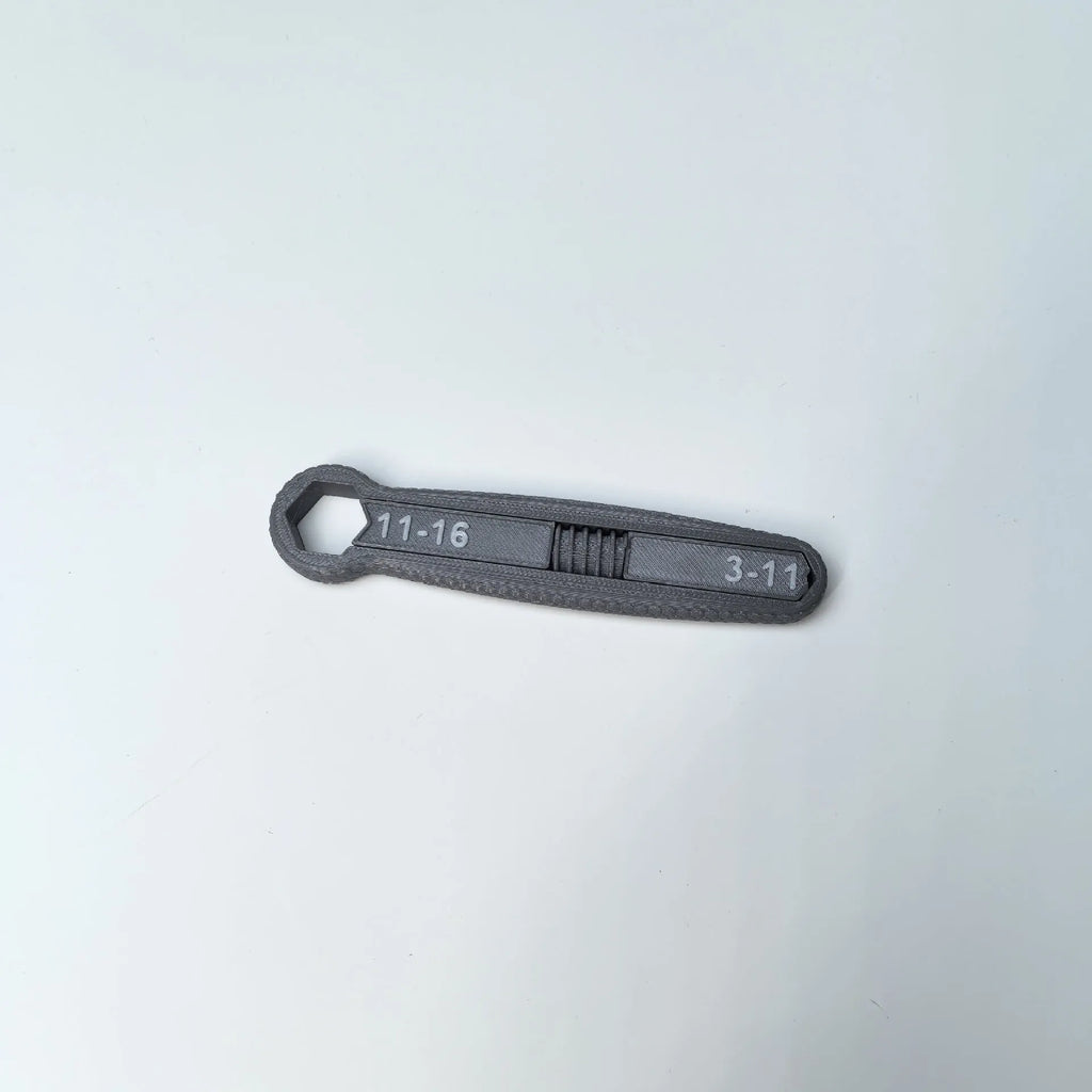 Portable multi-function plastic hand exercise tool in gray for finger strength training