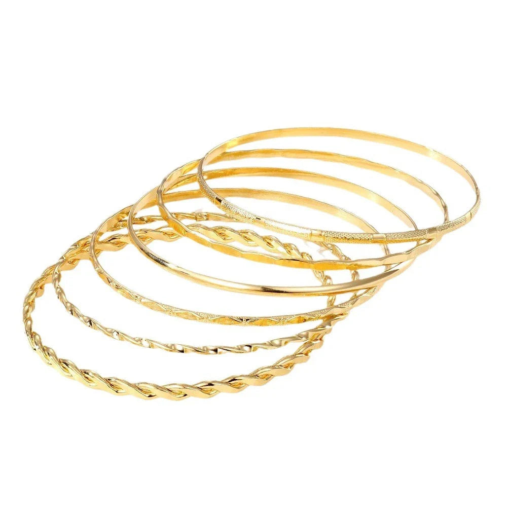 Stylish Bohemian chain bracelets in a gold tone color with geometric shapes, perfect for fashion-forward women