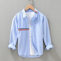 Hong Kong style loose fit casual shirt in polyester blend fabric with non-ironing feature