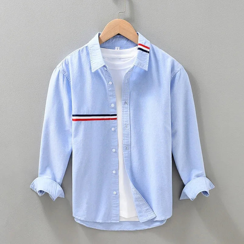 Hong Kong style loose fit casual shirt in polyester blend fabric with non-ironing feature