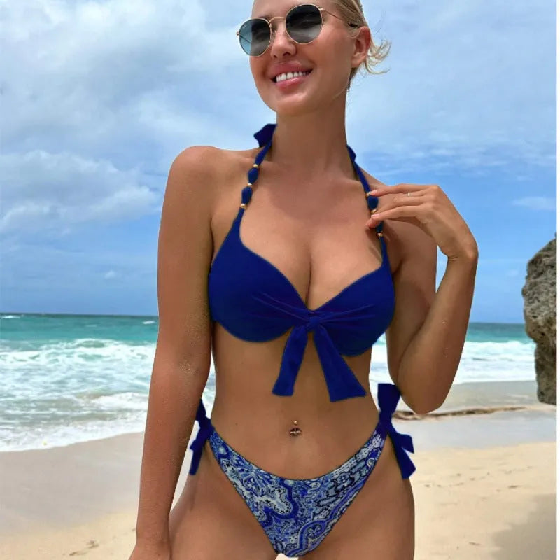 Ladies' striped and solid colour polyester bikini swimsuit set on hanger
