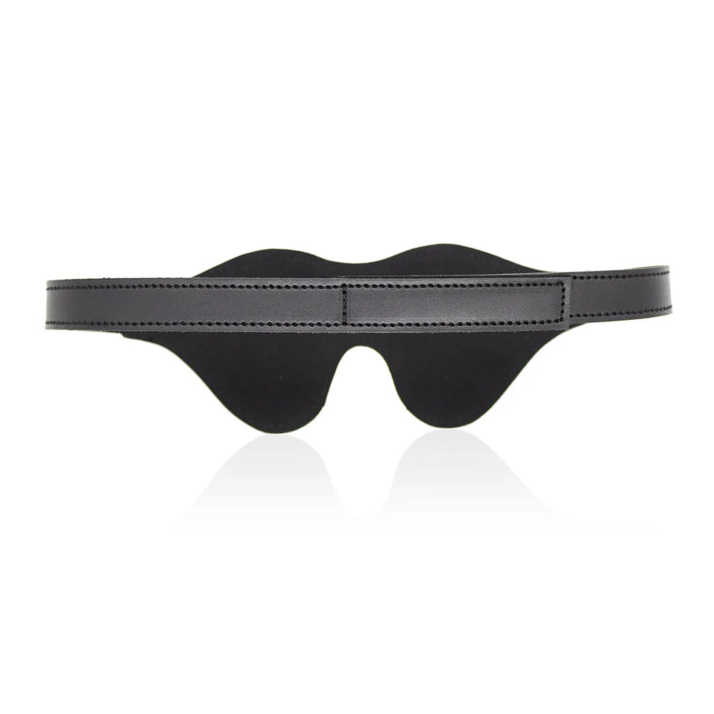 Women's black leather velcro eye mask blindfold showing three-dimensional shape and metal hardware.