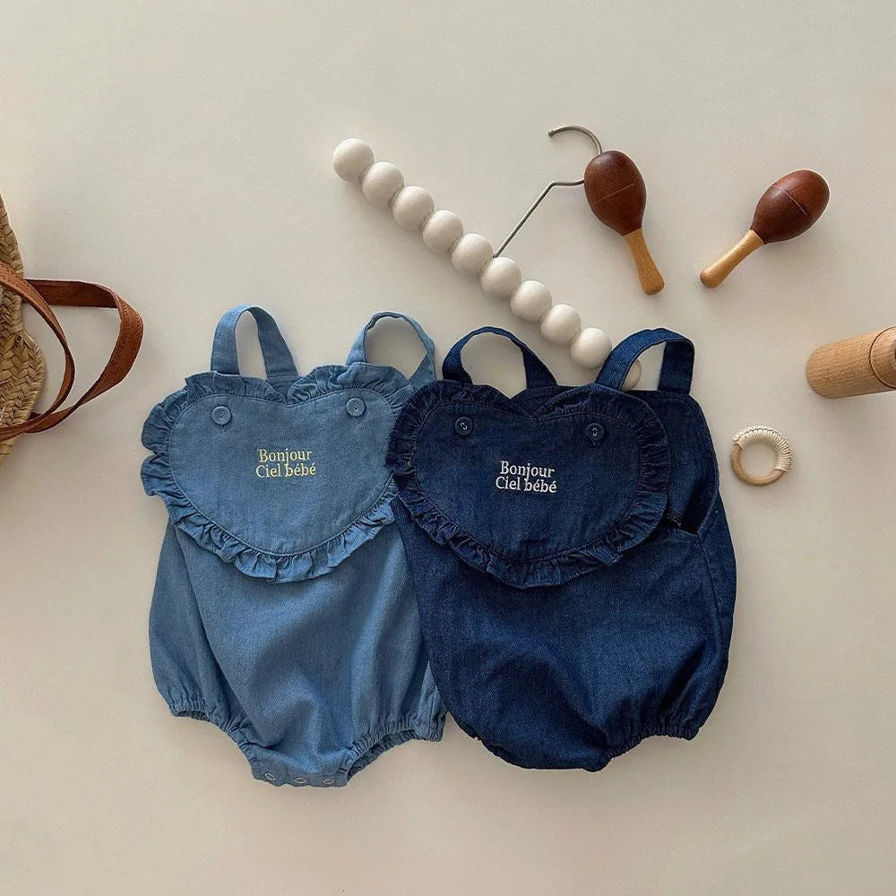 Newborn pure cotton embroidered denim romper in dark blue, sleeveless triangle jumpsuit on white background