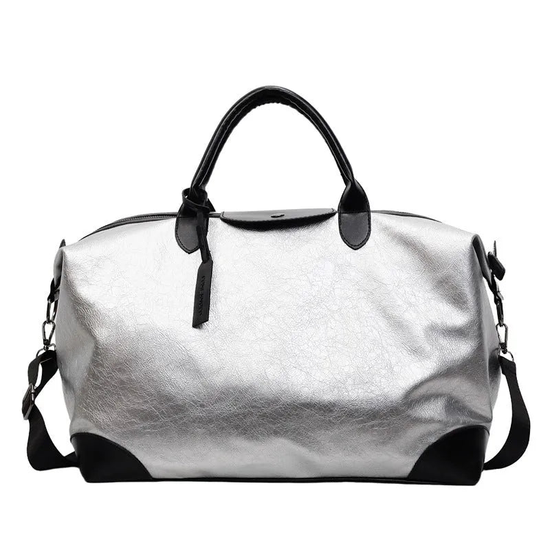 Women's large capacity hand-carry travel bag in black or silver colours with 36-55 litre volume