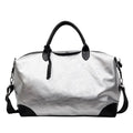 Women's large capacity hand-carry travel bag in black or silver colours with 36-55 litre volume