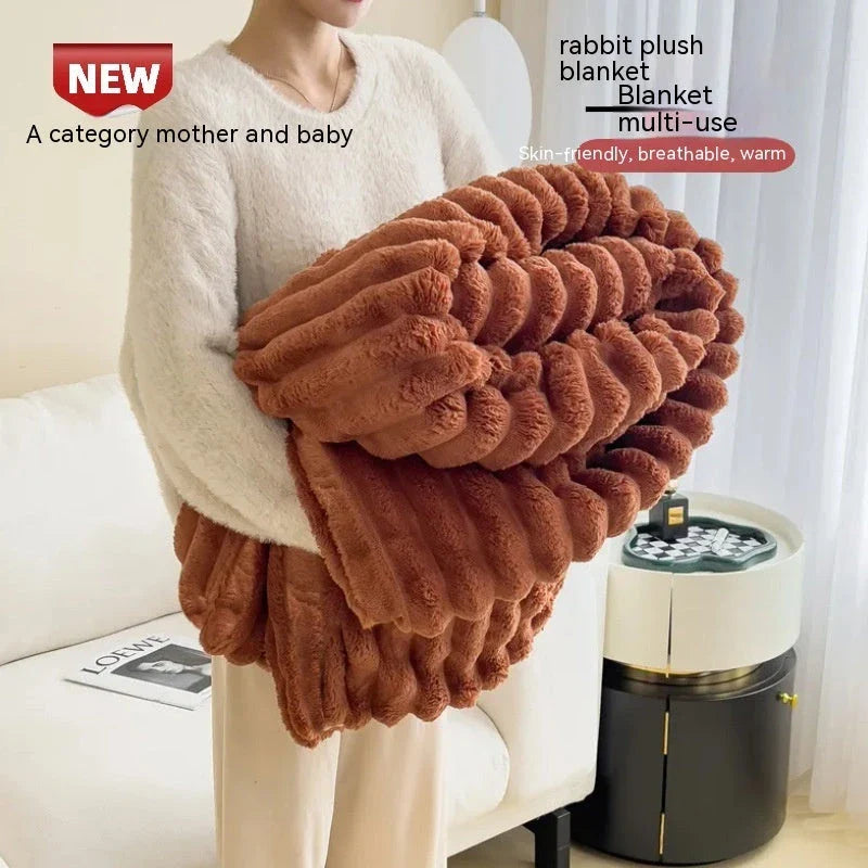 Luxurious faux rabbit fur blanket in various soft and cozy colors, featuring a thick and plush design for maximum warmth and comfort.