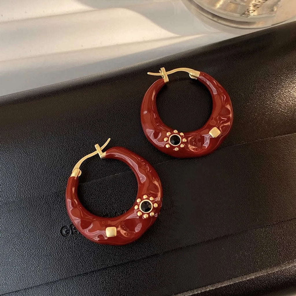 Hong Kong style retro ear studs with rhinestone inlay in black and red colour options