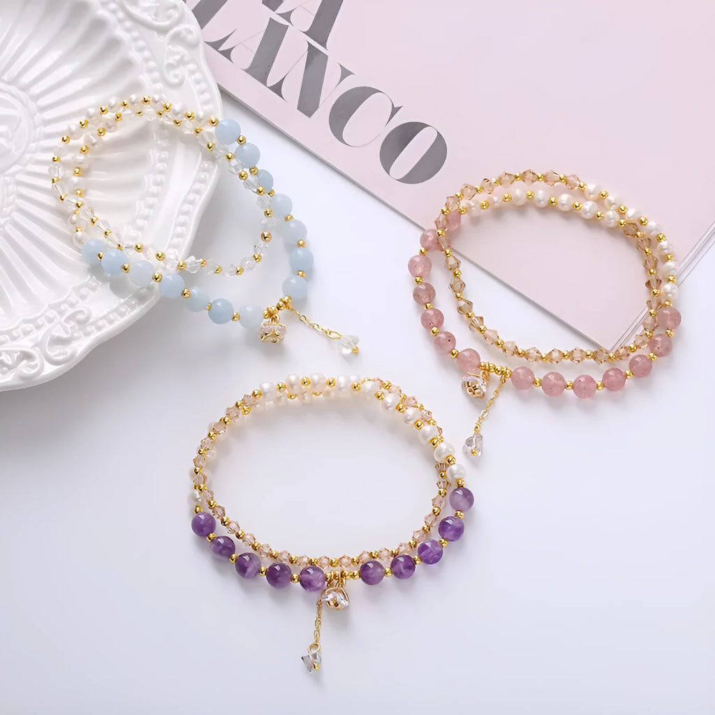 Women's double ring bracelet with freshwater pearls and coloured crystals in amethyst, aquamarine, or strawberry quartz options