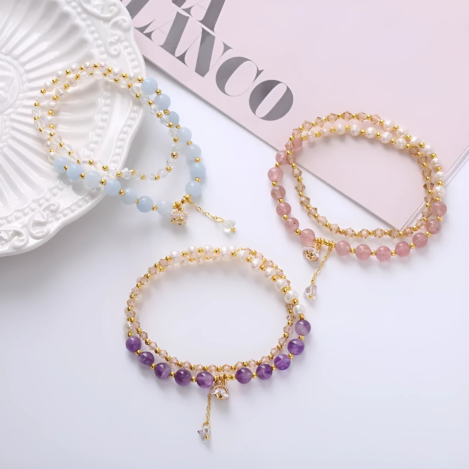 Women's double ring bracelet with freshwater pearls and coloured crystals in amethyst, aquamarine, or strawberry quartz options