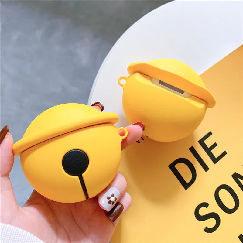 Yellow silicone protective case for AirPods 1 and 2 with a small bell charm attached.