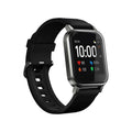 Black waterproof smart bracelet with 1.4-inch screen showing health metrics on silicone wrist strap