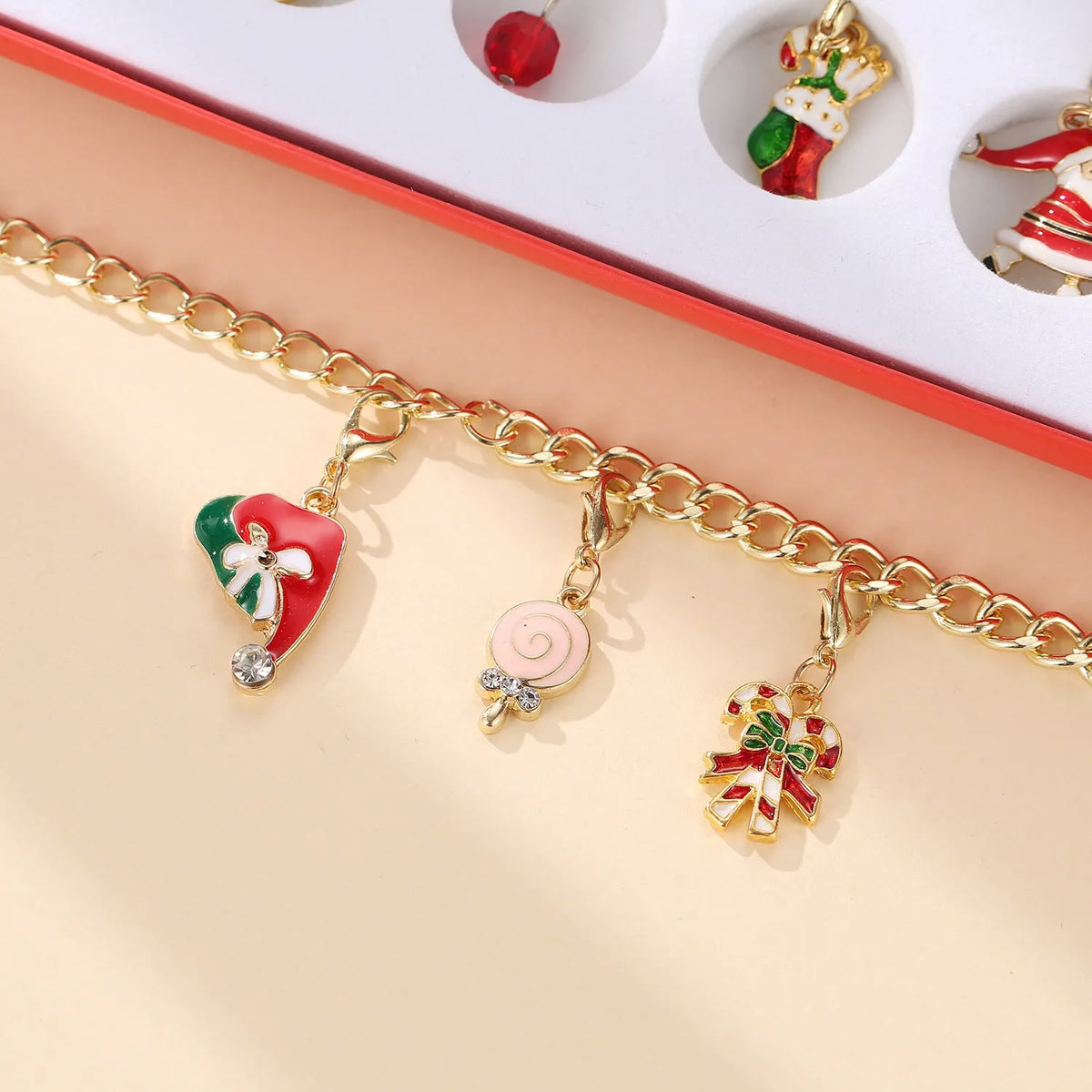 Red Christmas advent calendar DIY charm bracelet and necklace making kit with 22 mini alloy charms and beads, 21cm x 16cm x 1.8cm