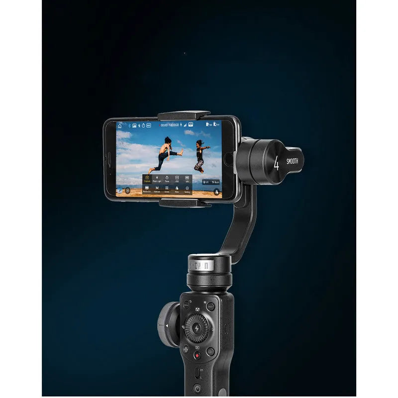 Black ABS plastic handheld smartphone video stabiliser gimbal on a table.