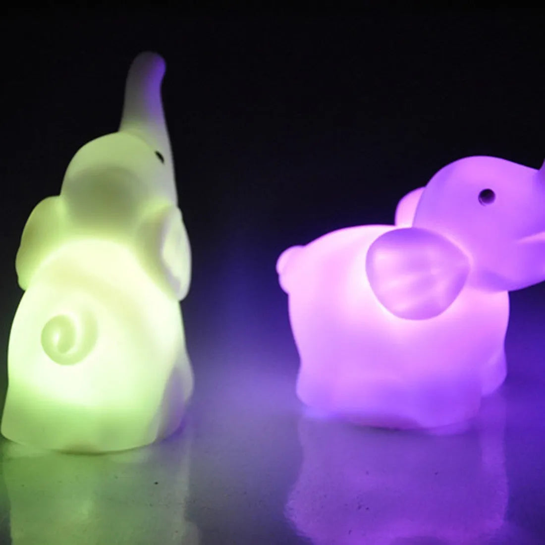 Elephant night light, vinyl, 8x8.8x4.5cm, battery operated, 7 colour slow flashing lamp