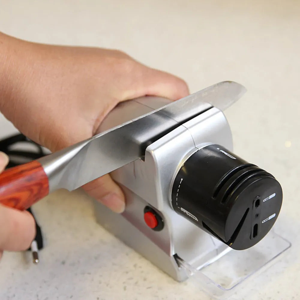 Silver electric knife sharpener with ABS body and gold accents, size 19 x 16.6 x 6.3cm