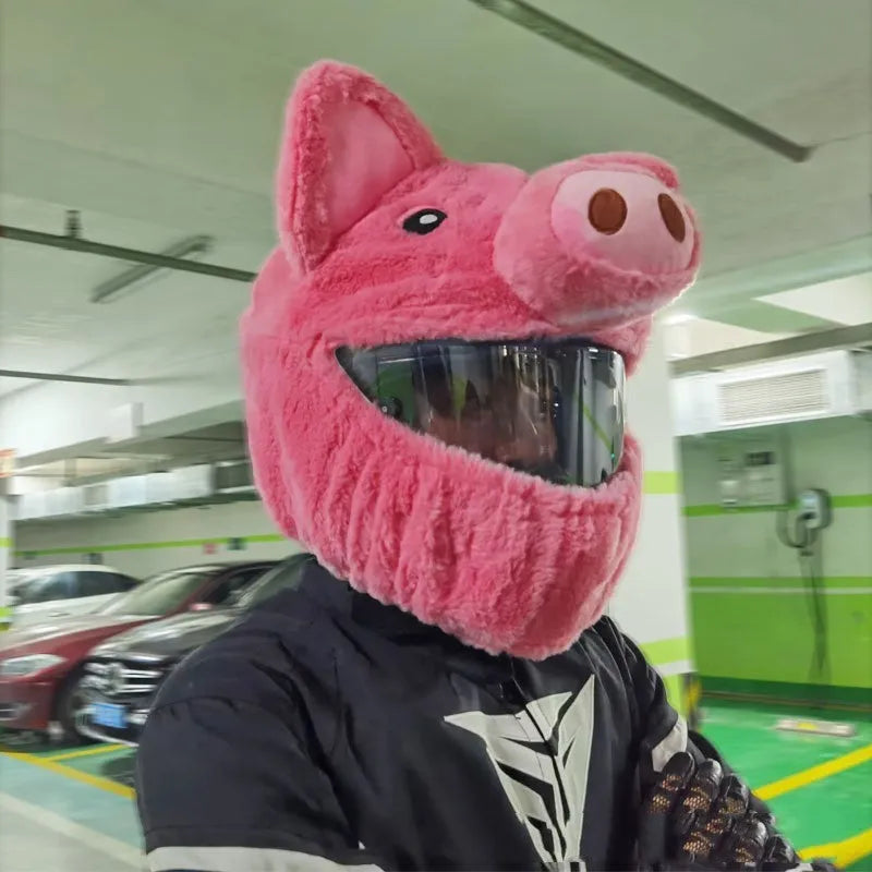 Pink pig cartoon design plush hood for wearing under a motorcycle helmet.