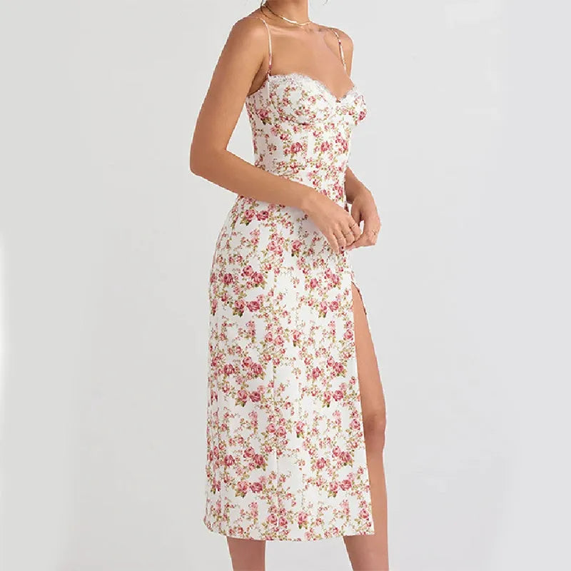 Women's blue lace flowers print maxi dress with suspender straps and a side slit.