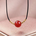 Hand-woven red agate bead bracelet and necklace set for women in national style.