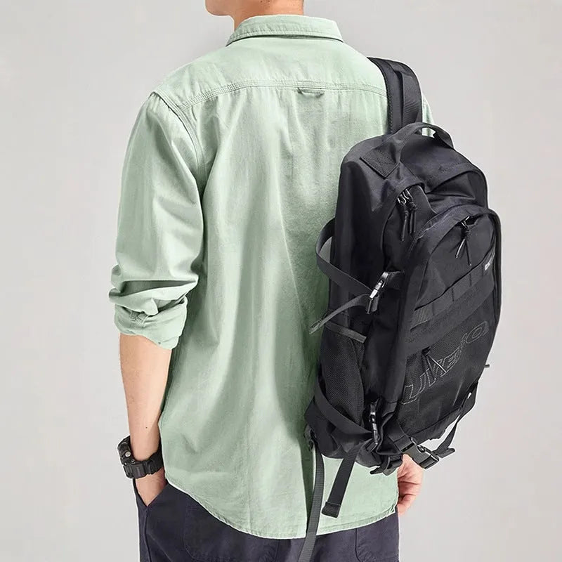 Men's loose fit long sleeve polyester overall shirt in light grey.