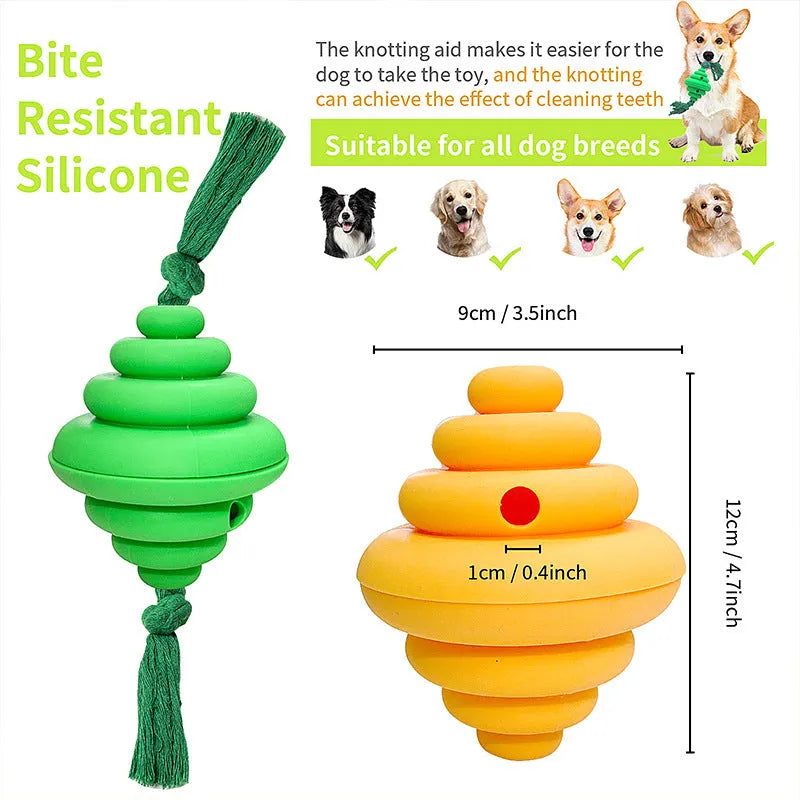 Green and yellow silicone dog ball with integrated rope, shown as a treat-dispensing and tug toy.