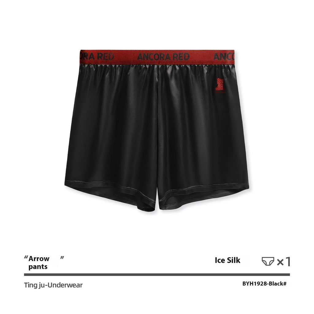 Men's solid colour boxer briefs in black on a mid-waist model.
