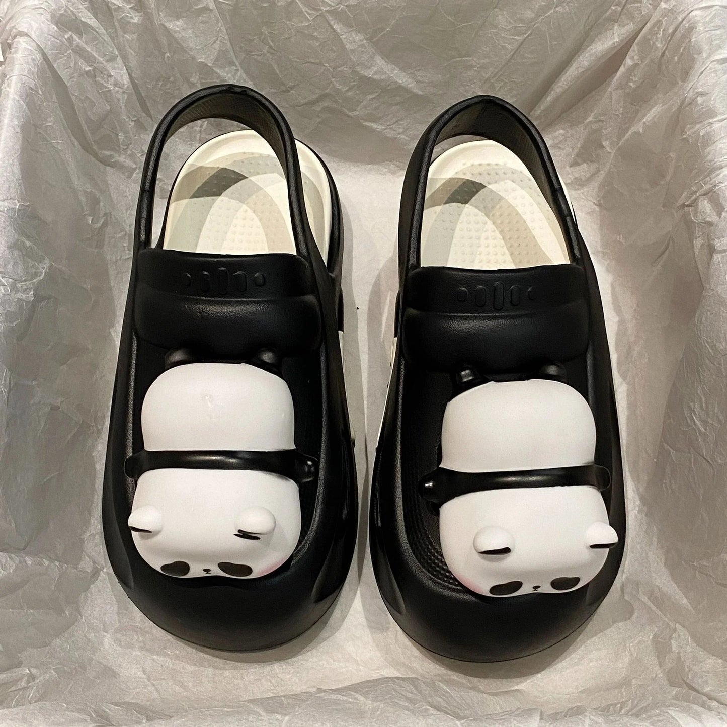 Adorable panda-themed slippers with LED lamp feature, offering cozy comfort and whimsical style for summer